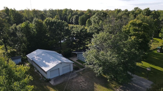 bird's eye view featuring a forest view