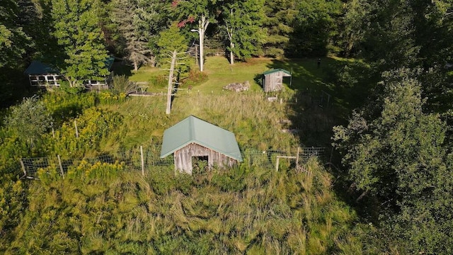 aerial view featuring a view of trees