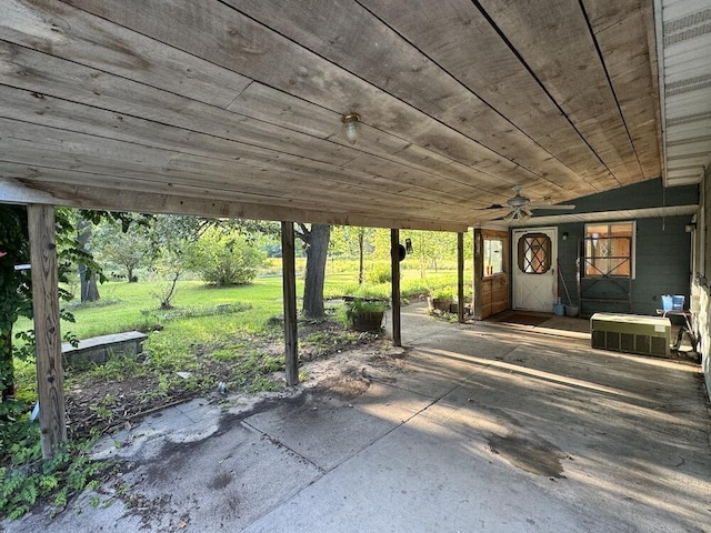 view of patio / terrace featuring a carport and ceiling fan