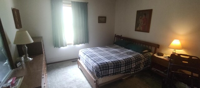 bedroom featuring carpet flooring