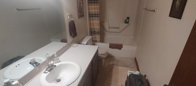 full bathroom with vanity, toilet, and shower / tub combo with curtain