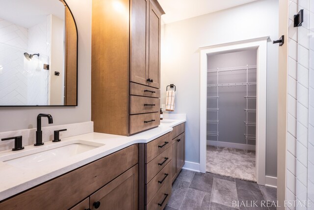 bathroom featuring vanity and tile patterned flooring