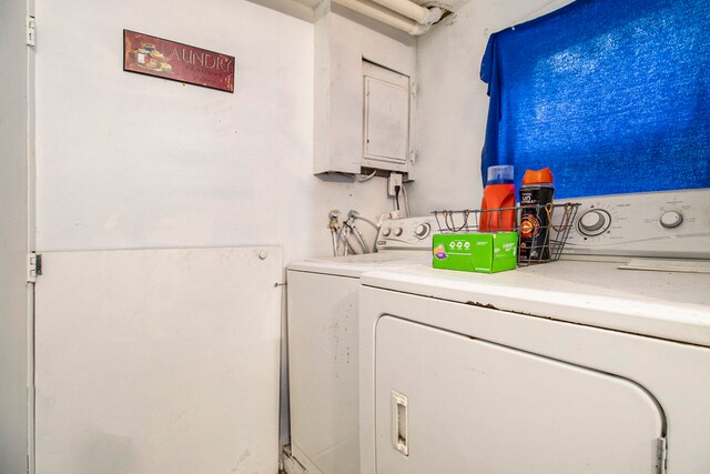 washroom with independent washer and dryer