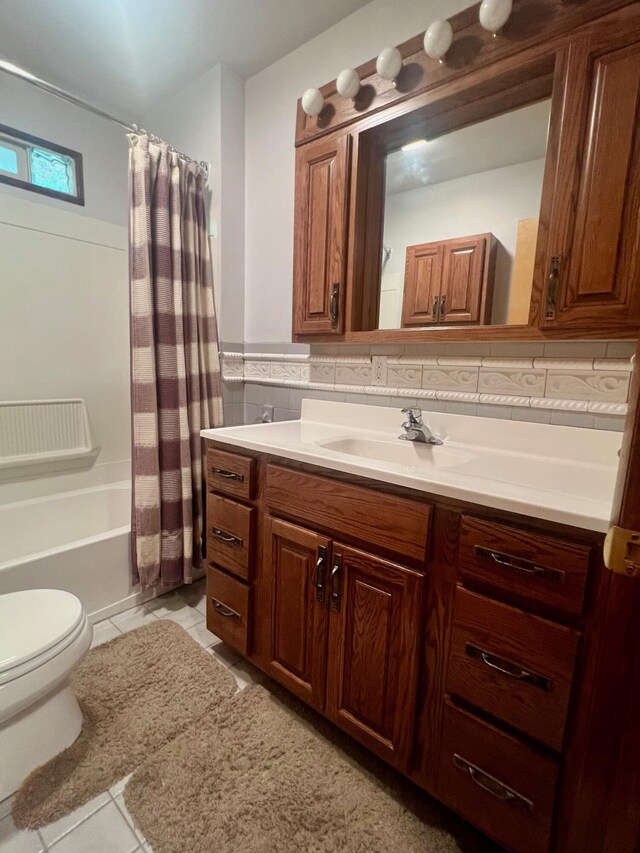 full bathroom with toilet, tile patterned flooring, vanity, backsplash, and shower / bathtub combination with curtain