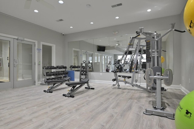 exercise room featuring baseboards, visible vents, wood finished floors, french doors, and recessed lighting