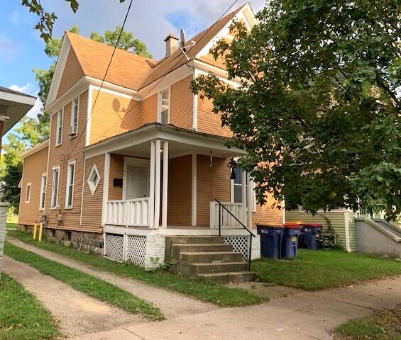 view of home's exterior featuring covered porch