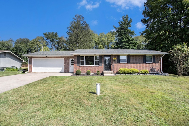 single story home featuring a garage and a front lawn