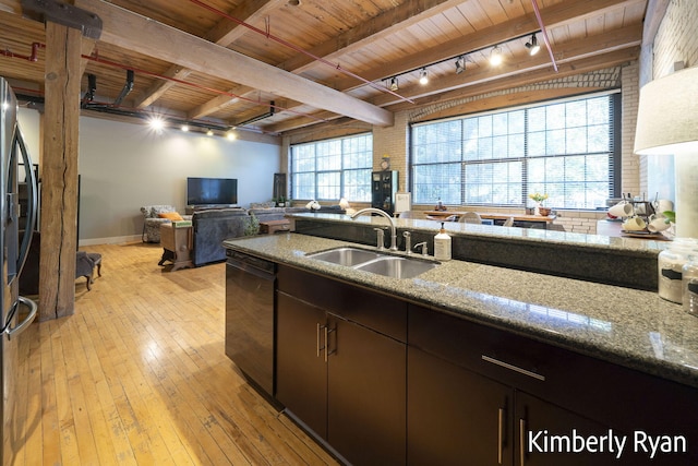 kitchen with dishwasher, sink, rail lighting, light hardwood / wood-style flooring, and wooden ceiling