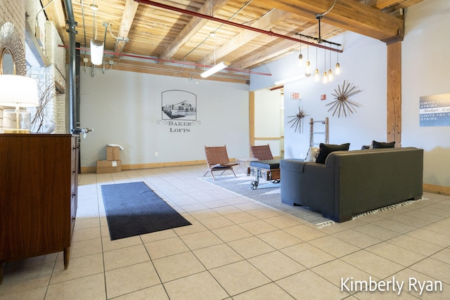 tiled living room featuring wooden ceiling and beam ceiling