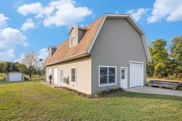 rear view of house featuring a lawn