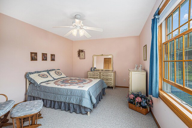 bedroom featuring carpet floors and ceiling fan