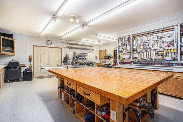 dining space featuring a workshop area