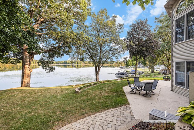 view of patio featuring a water view