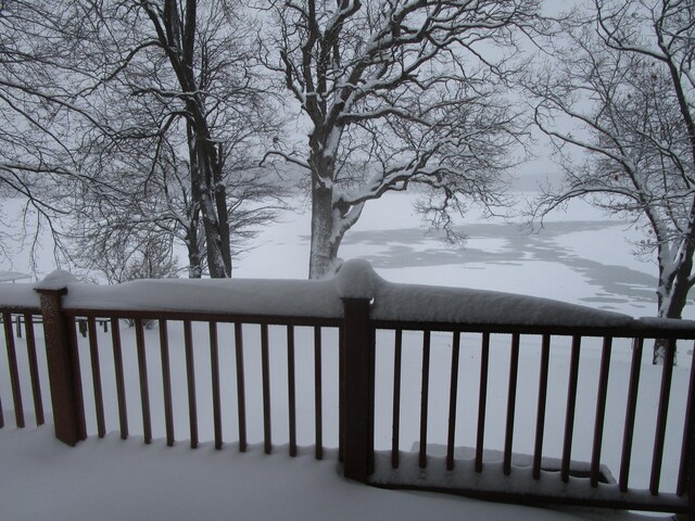 view of snow covered deck