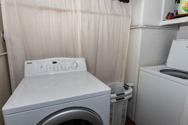 laundry area with washer / dryer