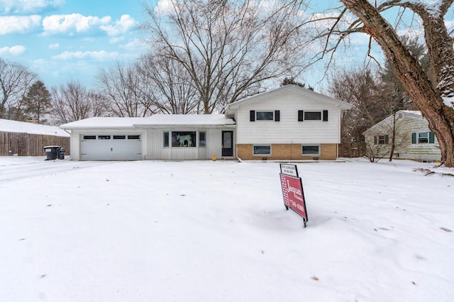 split level home with a garage