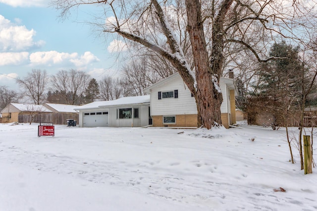 tri-level home featuring a garage