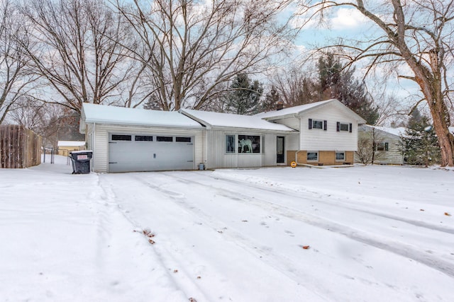 split level home featuring a garage