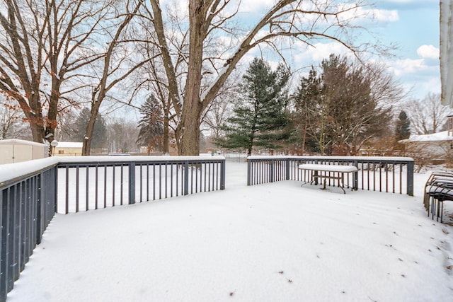 view of snow covered deck