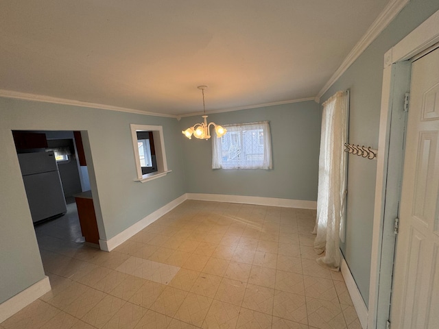 unfurnished dining area with crown molding and an inviting chandelier