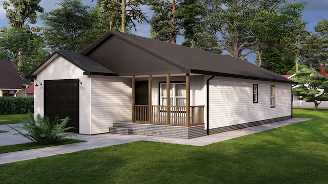 view of front of property featuring covered porch, a garage, and a front lawn