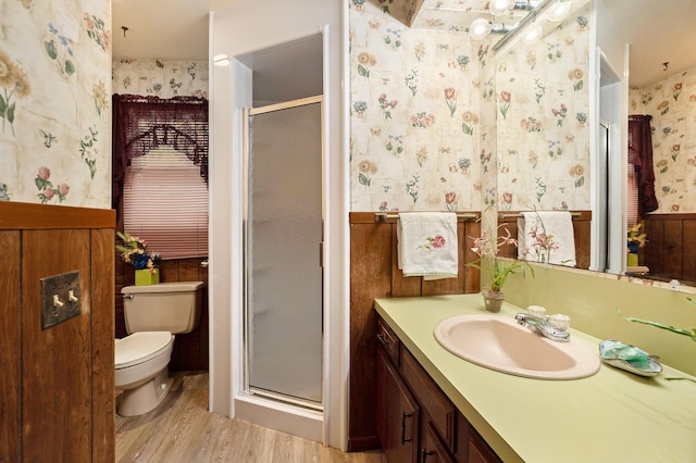 5540 Cozy Point Dr, Newaygo, MI 49337 - full bathroom with wallpapered walls, a wainscoted wall, toilet, wood finished floors, and vanity