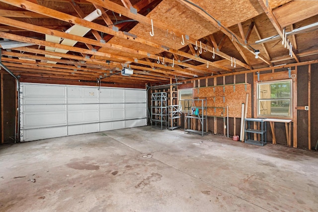 5540 Cozy Point Dr, Newaygo, MI 49337 - garage with a garage door opener
