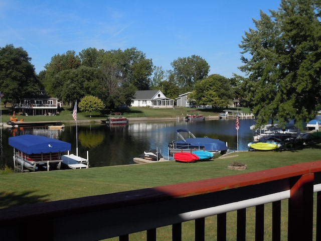 property view of water featuring a boat dock