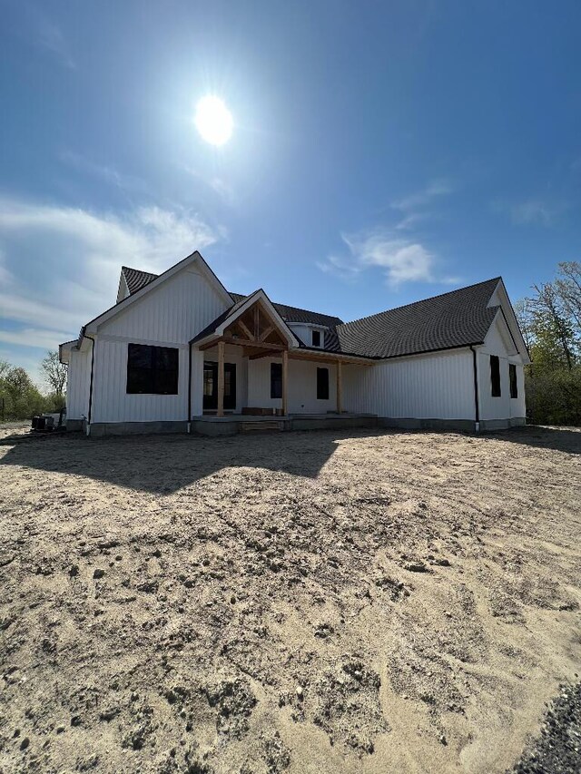 modern farmhouse style home with covered porch