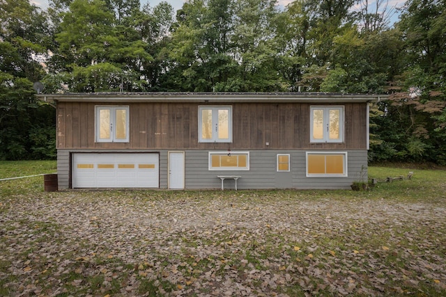 exterior space with a garage