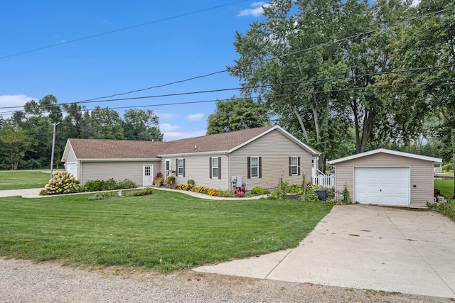 view of front facade with a garage, an outdoor structure, and a front yard