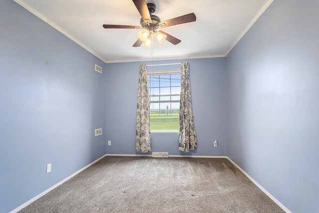 carpeted empty room with ceiling fan and ornamental molding