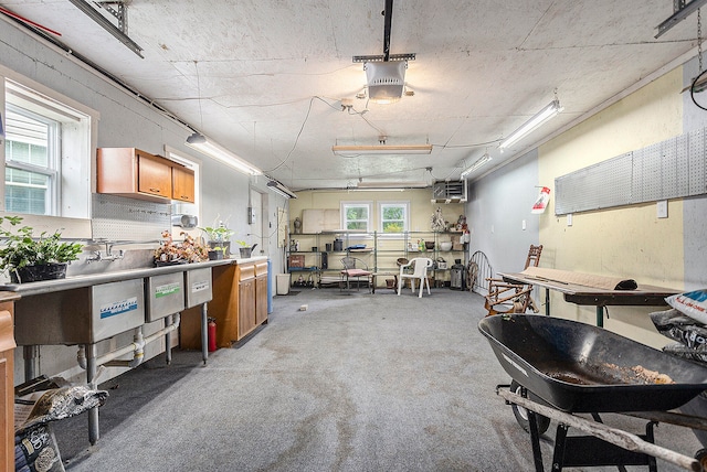 interior space with a workshop area and a garage door opener