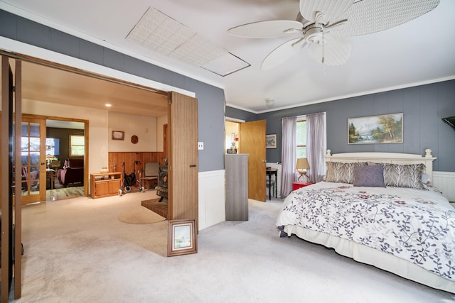 bedroom with ceiling fan and light colored carpet