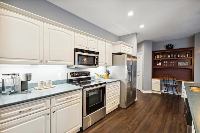 kitchen featuring open shelves, dark wood-style floors, white cabinetry, recessed lighting, and appliances with stainless steel finishes