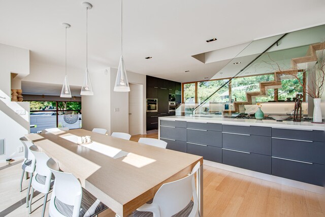 dining area with light wood-type flooring