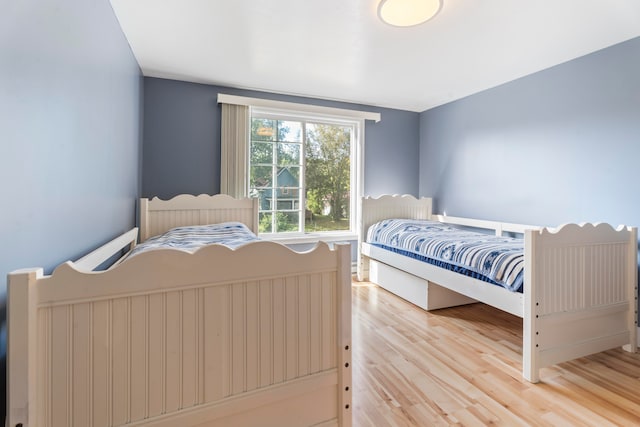 bedroom with light wood-type flooring