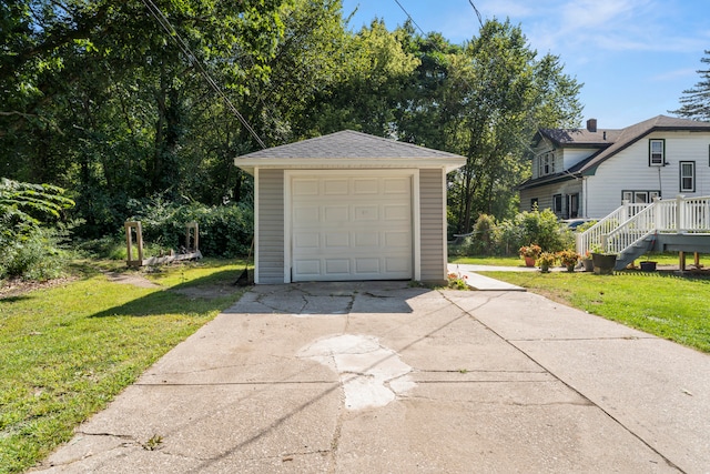 garage with a yard