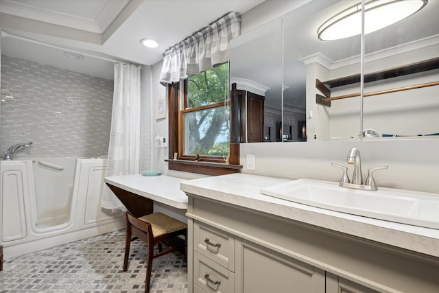 bathroom featuring crown molding, vanity, and independent shower and bath