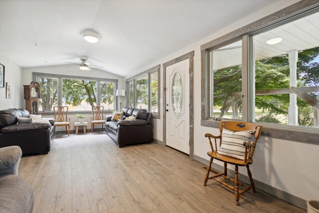 sunroom / solarium featuring vaulted ceiling and ceiling fan