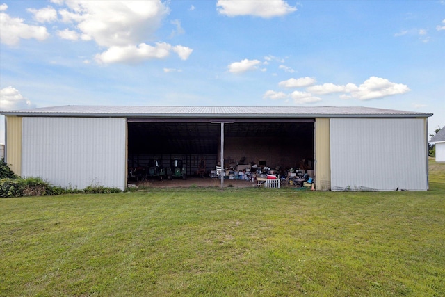 view of outdoor structure with a yard