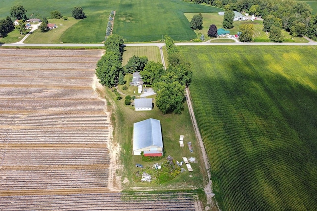 birds eye view of property with a rural view