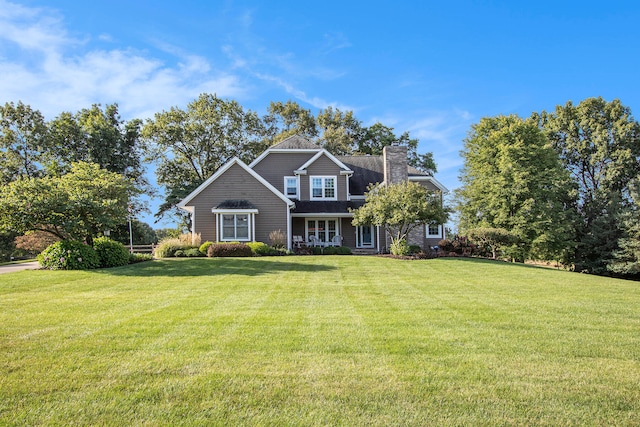 view of front of house with a front lawn