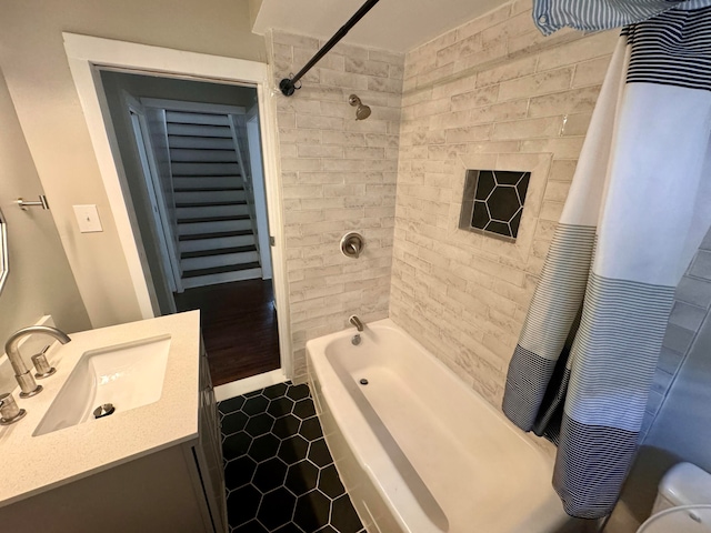 bathroom with vanity, tile patterned floors, and shower / bath combo