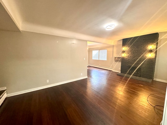 interior space featuring a baseboard radiator and dark hardwood / wood-style floors