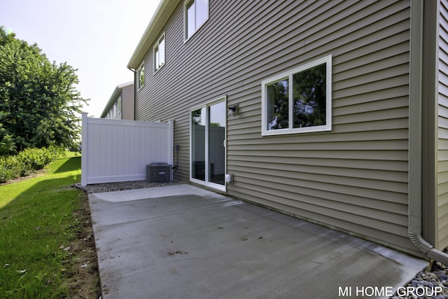 view of patio featuring cooling unit