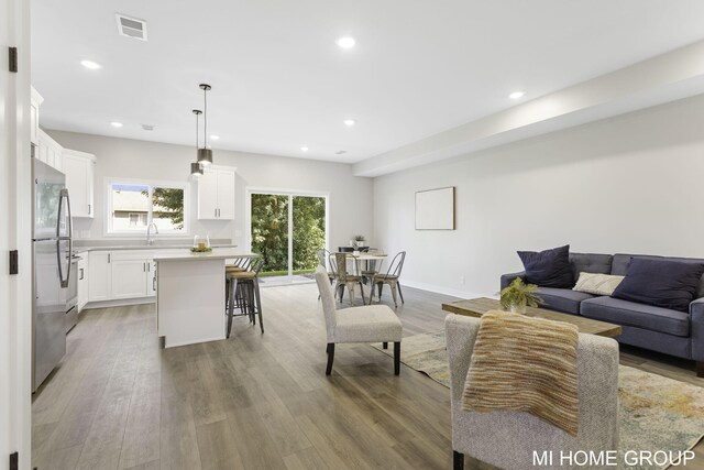 living room featuring light hardwood / wood-style floors