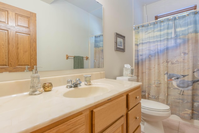 bathroom featuring vanity, toilet, a shower with curtain, and tile patterned flooring