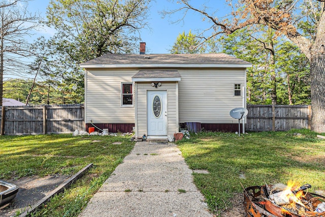 6991 E Apple Ave, Muskegon, MI 49442 - view of outbuilding with fence and a fire pit