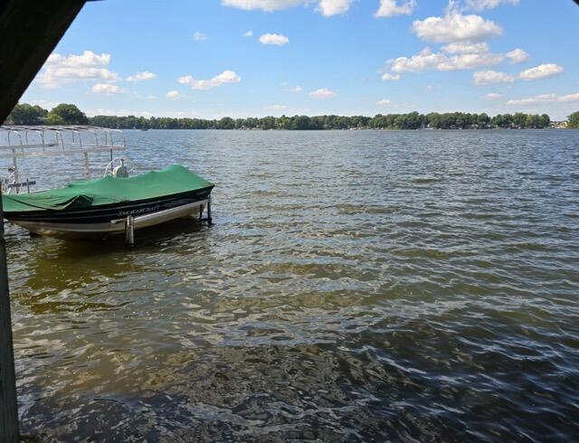 view of dock with a water view